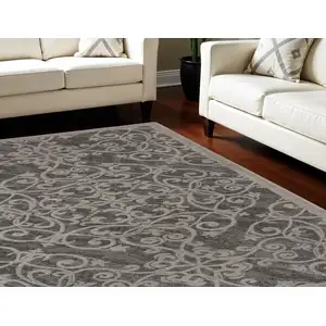 Photo of Charcoal and Gray Damask Distressed Area Rug