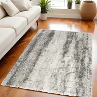 Photo of Charcoal and Ivory Abstract Shag Area Rug