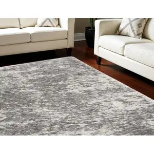 Photo of Charcoal and Ivory Abstract Shag Area Rug