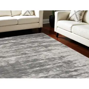 Photo of Charcoal and Ivory Abstract Shag Area Rug