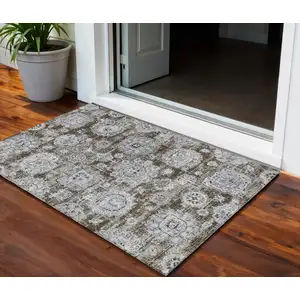 Photo of Chocolate And Blue Floral Washable Indoor Outdoor Area Rug