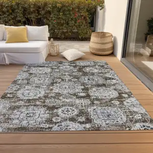 Photo of Chocolate And Blue Floral Washable Indoor Outdoor Area Rug