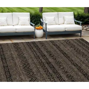 Photo of Chocolate And Brown Southwestern Washable Indoor Outdoor Area Rug