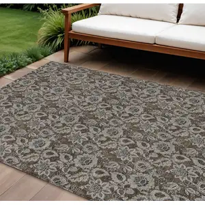 Photo of Chocolate And Charcoal Floral Washable Indoor Outdoor Area Rug