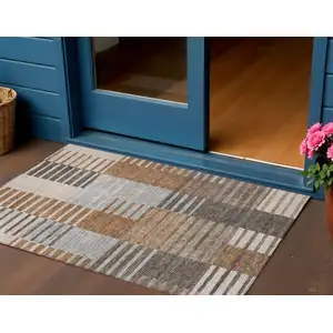 Photo of Chocolate And Gray Striped Washable Indoor Outdoor Area Rug