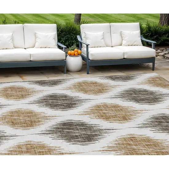 Chocolate And Ivory Ikat Washable Indoor Outdoor Area Rug Photo 1