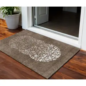 Photo of Chocolate And Taupe Abstract Washable Indoor Outdoor Area Rug