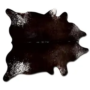 Photo of Chocolate And White Cowhide - Area Rug