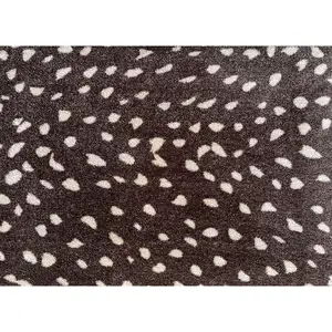 Photo of Chocolate Animal Print Washable Area Rug With UV Protection