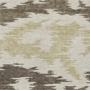 Photo of Chocolate Beige And Gold Abstract Washable Indoor Outdoor Area Rug