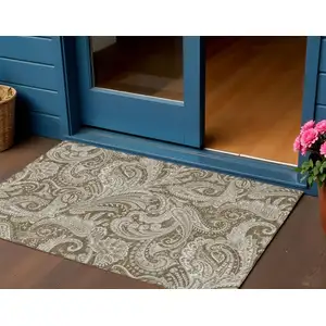 Photo of Chocolate Beige And Ivory Paisley Washable Indoor Outdoor Area Rug