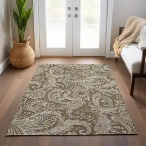 Photo of Chocolate Beige And Ivory Paisley Washable Indoor Outdoor Area Rug