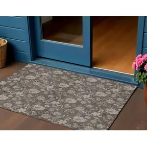 Photo of Chocolate Beige And Taupe Floral Washable Indoor Outdoor Area Rug