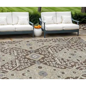 Photo of Chocolate Gray And Beige Floral Washable Indoor Outdoor Area Rug