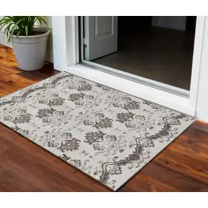 Photo of Chocolate Taupe And Beige Oriental Washable Indoor Outdoor Area Rug