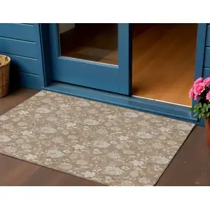 Photo of Copper And Beige Floral Washable Indoor Outdoor Area Rug