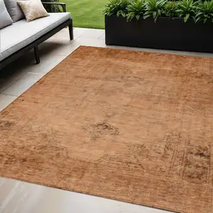 Photo of Copper Orange And Brown Oriental Washable Indoor Outdoor Area Rug