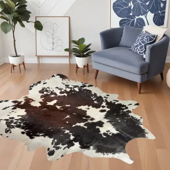 Brown and White Cowhide Hand Knotted Area Rug Photo 1