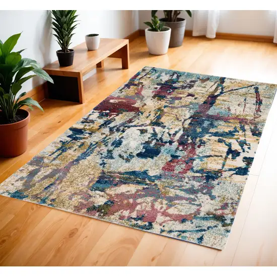 Cream Blue and Green Abstract Distressed Area Rug Photo 1