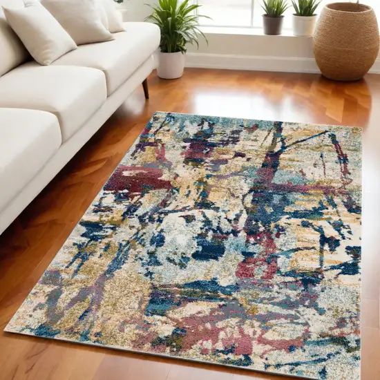 Cream Blue and Green Abstract Distressed Area Rug Photo 1