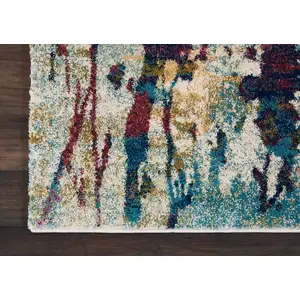 Photo of Cream Blue and Green Abstract Distressed Area Rug