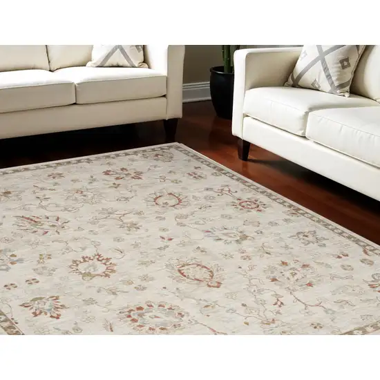 Cream Floral Power Loom Distressed Area Rug With Fringe Photo 1