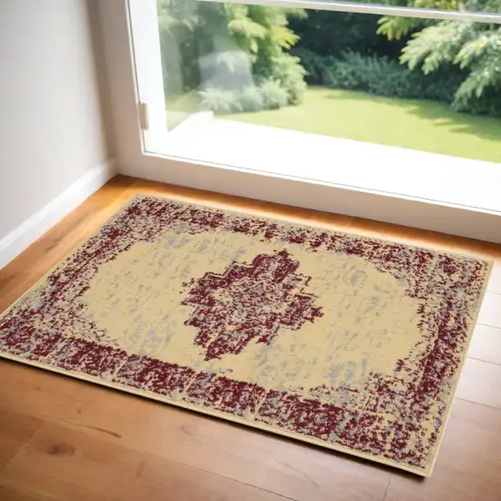 Cream Gray And Red Medallion Distressed Area Rug Photo 1