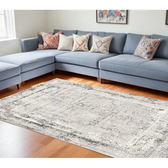 Gray and Ivory Abstract Power Loom Area Rug Photo 1