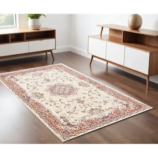 Orange and Ivory Oriental Power Loom Area Rug Photo 1