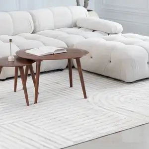 Photo of Cream and Beige Abstract Area Rug