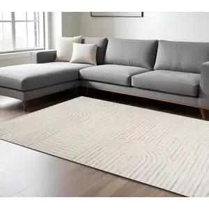 Photo of Cream and Beige Abstract Area Rug