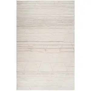 Photo of Cream and Beige Abstract Area Rug