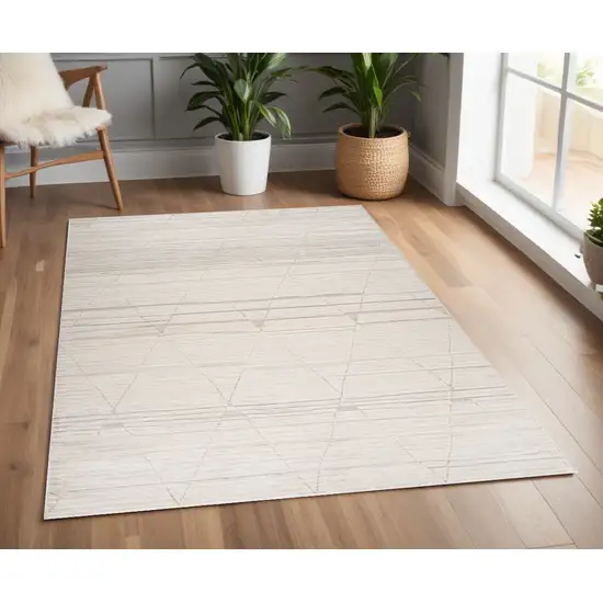 Cream and Beige Abstract Area Rug Photo 1