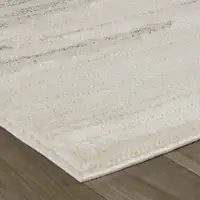 Photo of Cream and Beige Abstract Area Rug