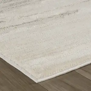 Photo of Cream and Beige Abstract Area Rug