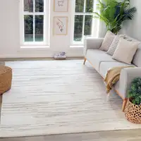 Photo of Cream and Beige Abstract Area Rug