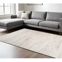 Photo of Cream and Beige Abstract Area Rug