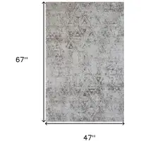 Photo of Cream and Beige Abstract Area Rug