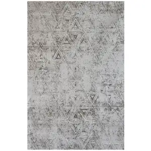 Photo of Cream and Beige Abstract Area Rug