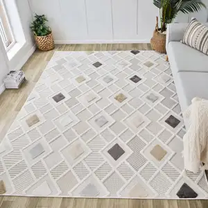 Photo of Cream and Beige Abstract Distressed Area Rug