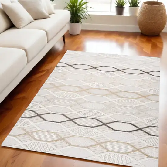 Cream and Beige Abstract Distressed Area Rug Photo 1