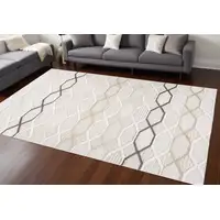 Photo of Cream and Beige Abstract Distressed Area Rug