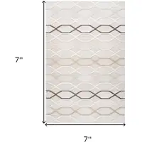 Photo of Cream and Beige Abstract Distressed Area Rug