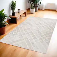 Photo of Cream and Beige Abstract Distressed Area Rug