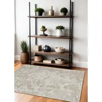 Photo of Cream and Beige Abstract Distressed Area Rug