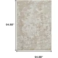 Photo of Cream and Beige Abstract Distressed Area Rug