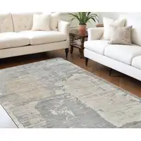 Photo of Cream and Beige Abstract Distressed Area Rug