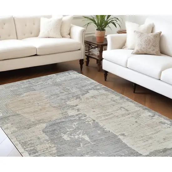 Cream and Beige Abstract Distressed Area Rug Photo 1