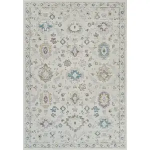 Photo of Cream and Beige Abstract Distressed Area Rug