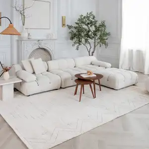 Photo of Cream and Beige Abstract Distressed Area Rug